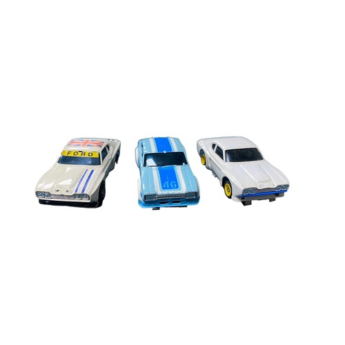 77 - Aurora AFX. 1970s onwards 1/64th scale slot cars collection, generally excellent to good plus (four ... 