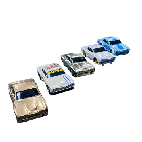 77 - Aurora AFX. 1970s onwards 1/64th scale slot cars collection, generally excellent to good plus (four ... 