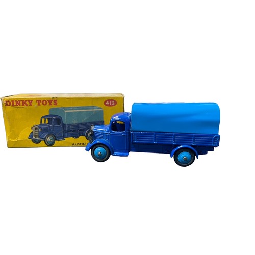 243 - Dinky. Austin Covered Wagon No. 413, generally excellent in good yellow Dinky Toys box (blue colour ... 