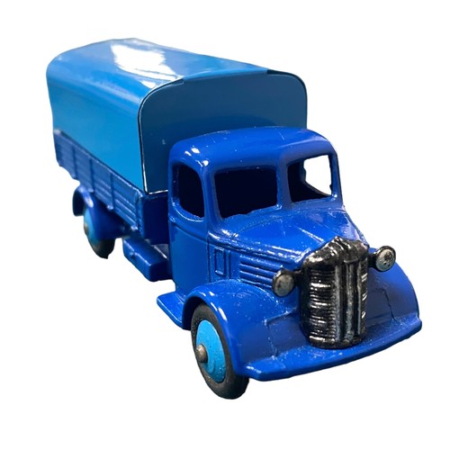 243 - Dinky. Austin Covered Wagon No. 413, generally excellent in good yellow Dinky Toys box (blue colour ... 