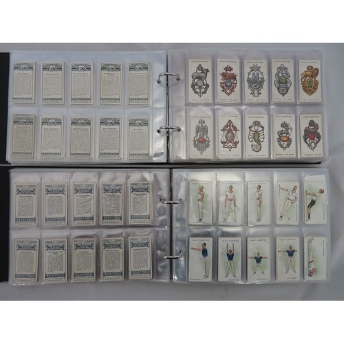 782 - Collection of Wills cigarette card sets in 4 albums,  in mixed condition, but generally good, with M... 