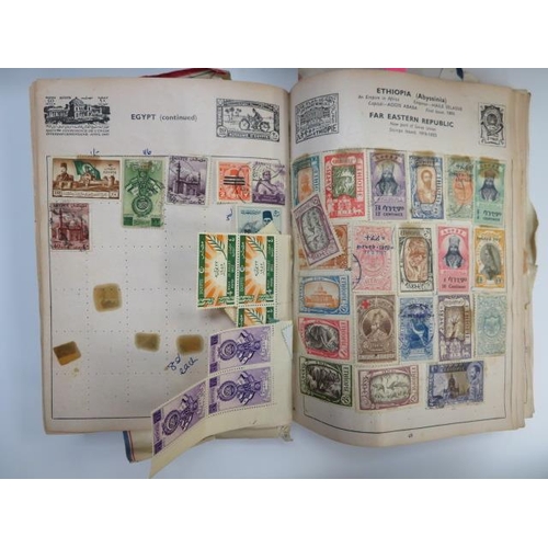 582 - A well-filled Worldwide childhood “hobby style” ‘The Improved Postage Stamp Album’ including various... 