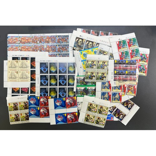 645 - 1975-2000 large range of Great Britain decimal issues stamps in unmounted mint (UM) blocks of four, ... 