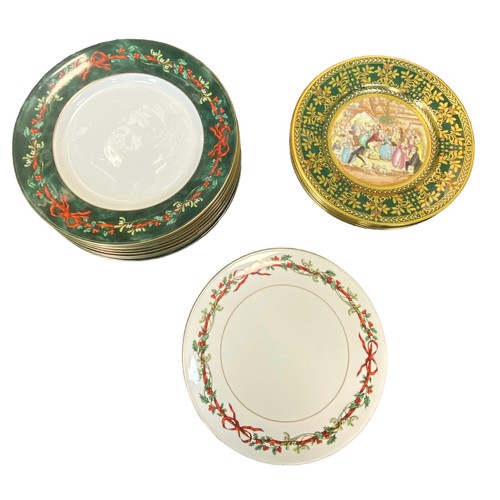 429 - A collection of Christmas & Santa themed ceramic items, with many collectable plates to include; Cav... 