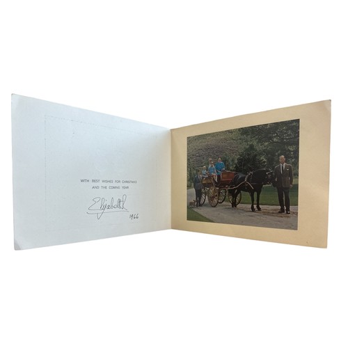 827 - A 1966 Christmas card from HM Queen Elizabeth II. Two gilt cyphers to cover, interior with photograp... 