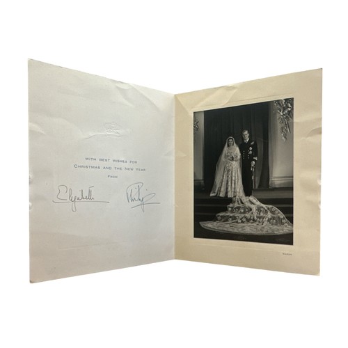 817 - A signed 1947 Christmas Card from TRH Princess Elizabeth and The Duke of Edinburgh.  A gilt embossed... 