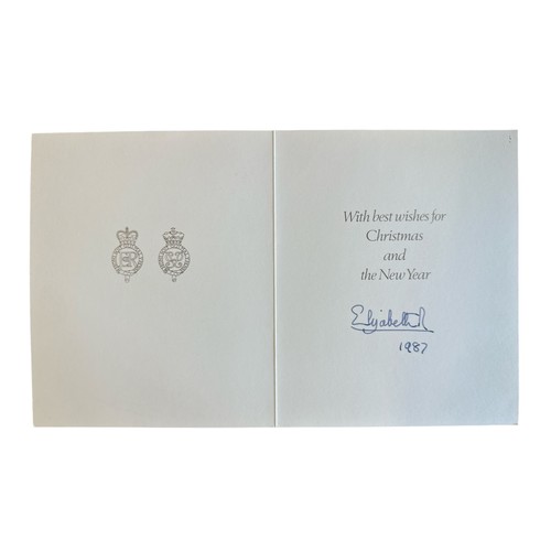 845 - A 1987 Christmas card sent by HM The Queen. Cover with a photograph of The Queen and The Duke of Edi... 