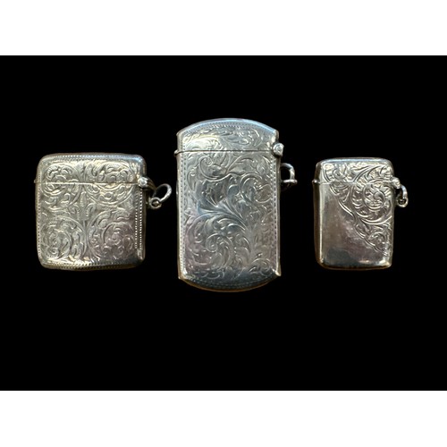 138 - 3 Silver Vesta lighters. A George V, 1914, lighter approx 63mm in length, an Edwardian lighter 1903 ... 