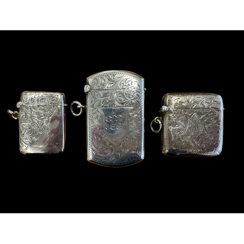 138 - 3 Silver Vesta lighters. A George V, 1914, lighter approx 63mm in length, an Edwardian lighter 1903 ... 