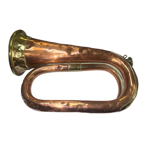 189 - A Copper and Brass military Bugle by Mayers & Harrison, Manchester. Numerous dents.