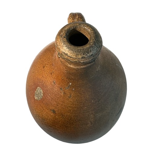 202 - Stoneware Bellarmine flagon, height 30cm.