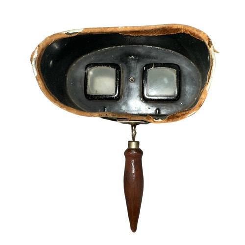 264 - A stereoscopic viewer made by Underwood & Underwood, markings on viewer reading ‘Man’f’d by Underwoo... 