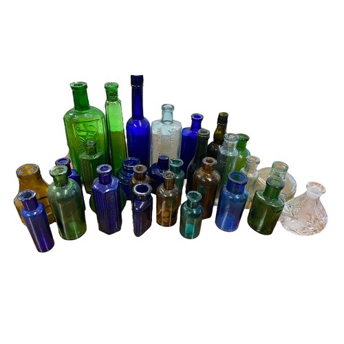 201 - A collection of various bottles in two boxes including; Poisons, Inks, Medicines, Ginger Beer with a... 