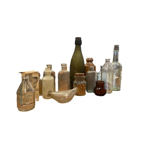 201 - A collection of various bottles in two boxes including; Poisons, Inks, Medicines, Ginger Beer with a... 