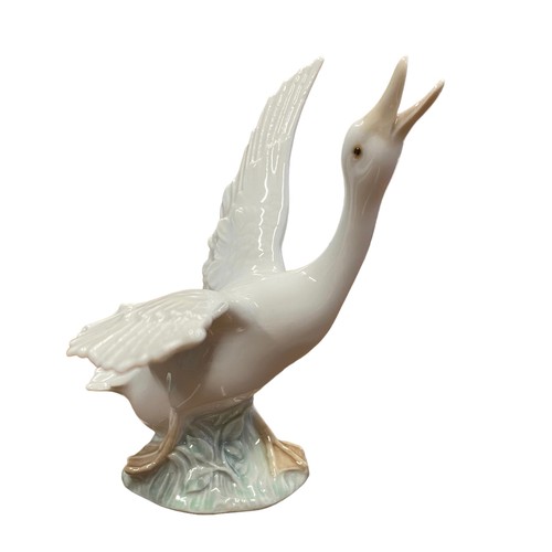 442 - A selection of boxed ceramic Lladro items to include; three boxed Goose figures in different poses (... 