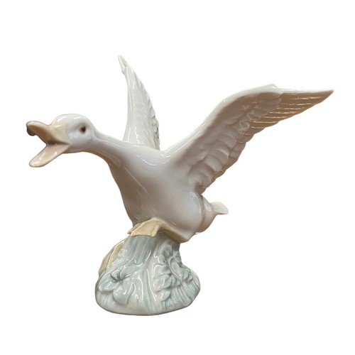 442 - A selection of boxed ceramic Lladro items to include; three boxed Goose figures in different poses (... 