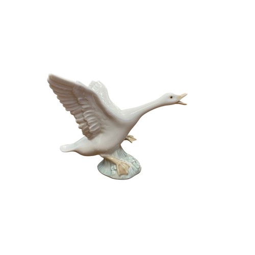 442 - A selection of boxed ceramic Lladro items to include; three boxed Goose figures in different poses (... 