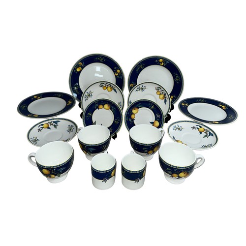 329 - A Wedgwood Bone China Citrons (1993) part service to include; two small coffee cups and saucers, fou... 