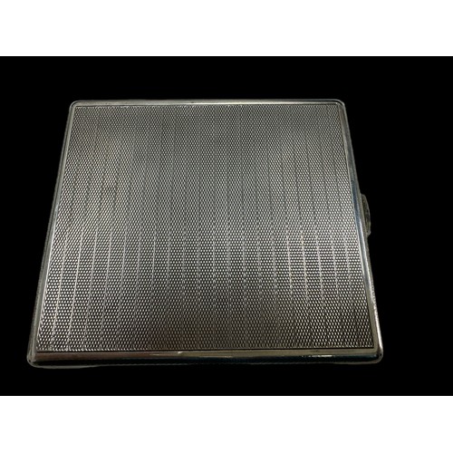 482 - A silver cigarette case with 1931 Birmingham hallmarks. Dimension 83mm x 95mm and weight 130g approx