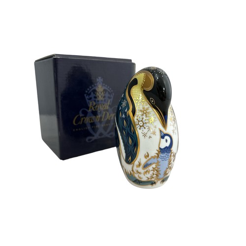 61 - A Royal Crown Derby Penguin and Chick paperweight, with silver stopper, 14cm high.  Boxed - needs re... 