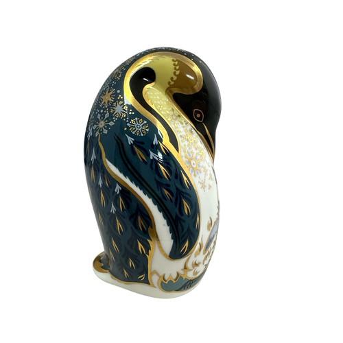 61 - A Royal Crown Derby Penguin and Chick paperweight, with silver stopper, 14cm high.  Boxed - needs re... 