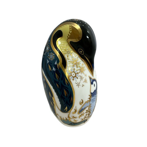 61 - A Royal Crown Derby Penguin and Chick paperweight, with silver stopper, 14cm high.  Boxed - needs re... 