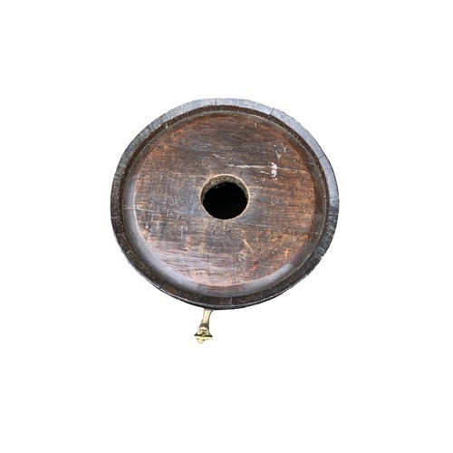 11 - Banded oak barrel with brass tap, height 35cm, diameter 38cm.