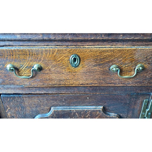 495 - Late 18th Century oak dresser base with central door with raised fielded panel, 7 working draws, ori... 