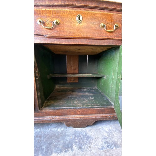 495 - Late 18th Century oak dresser base with central door with raised fielded panel, 7 working draws, ori... 