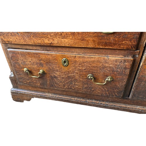 495 - Late 18th Century oak dresser base with central door with raised fielded panel, 7 working draws, ori... 