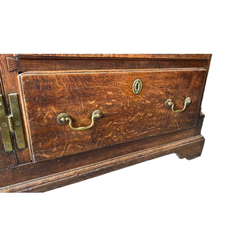 495 - Late 18th Century oak dresser base with central door with raised fielded panel, 7 working draws, ori... 