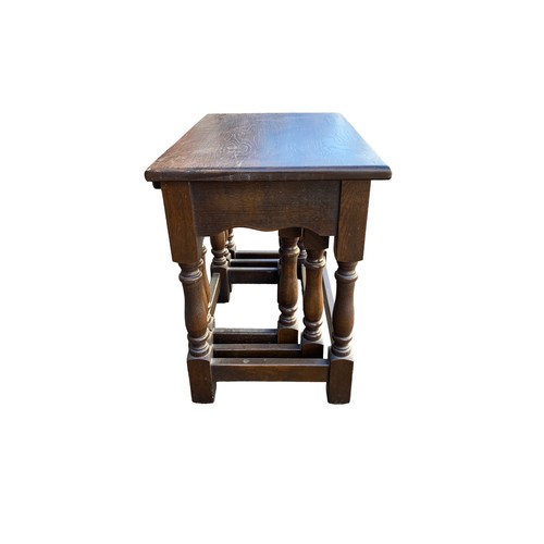 407 - Oak nest of 3 tables, largest measures: height 47cm, width 55cm and depth 35cm.