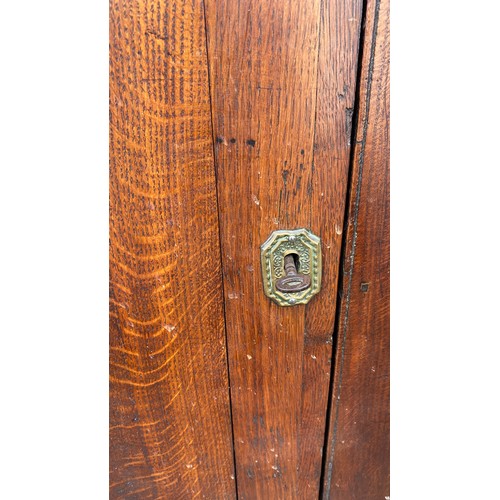 451 - Late 18th Century oak corner cupboard