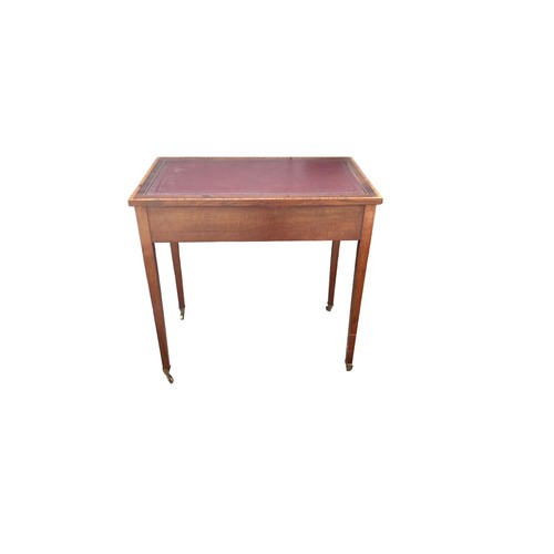 497 - Edwardian mahogany 2 drawer writing table, brass casters, width 76cm, depth 47cm, height 74cm.