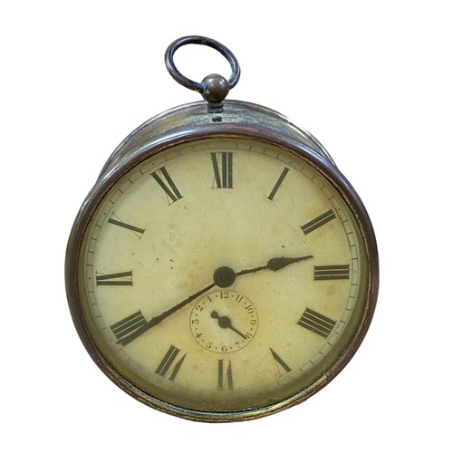 128 - Brass barrel alarm clock, 9.5cm diameter, in working order.