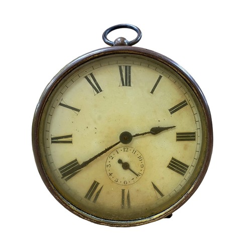 128 - Brass barrel alarm clock, 9.5cm diameter, in working order.