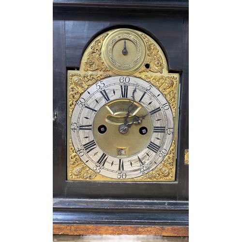 134 - 18th Century ebony veneered bracket clock. The arched brass dial with 'Strike/Silent' dial to the ar... 