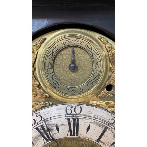 134 - 18th Century ebony veneered bracket clock. The arched brass dial with 'Strike/Silent' dial to the ar... 