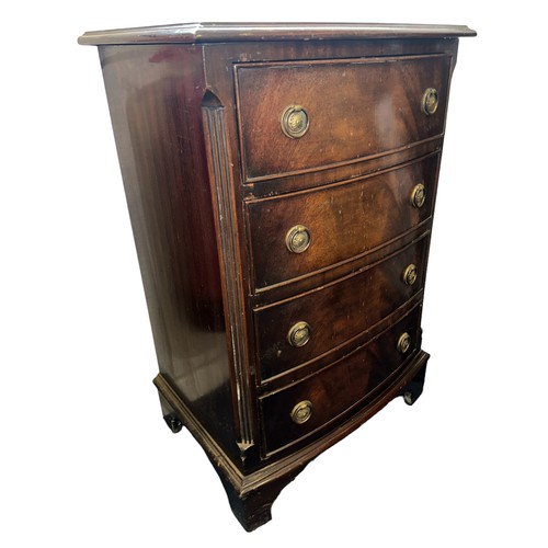 523 - Reproduction 4 drawer bow front chest of drawers, height 75cm, width 48cm, depth 37cm.