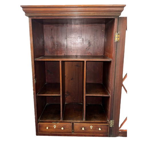 186 - Early 19th Century mahogany glazed wall-hanging cabinet with divided interior fitted with two base d... 