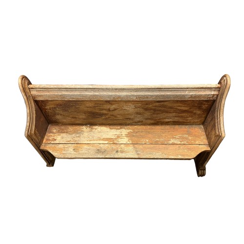 13 - A church oak pew, width 144cm, depth 46cm, height 88cm, weathered from being outdoors, some restorat... 