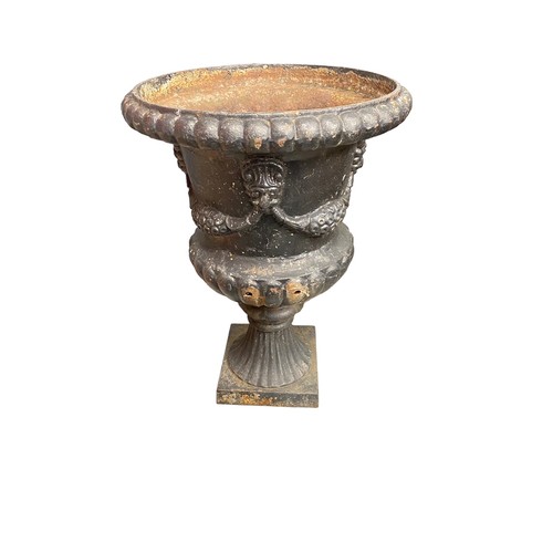 321 - Cast iron fluted tulip shaped garden urn/planter on stand, total height 92cm (stand is 30cm), diamet... 