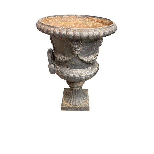 321 - Cast iron fluted tulip shaped garden urn/planter on stand, total height 92cm (stand is 30cm), diamet... 