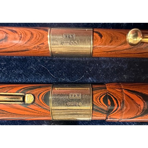 25 - Waterman Ideal 'Ripple' fountain pen and pencil cased twin set, both with 9ct gold bands initialled ... 