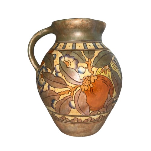 507 - A Bursley Ware Charlotte Rhead design jug. Height 22cm.