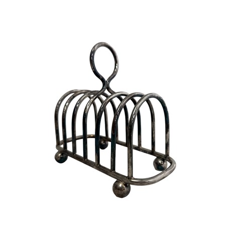 458 - Walker & Hall, Silver plated seven bar toast rack by Walker & Hall, central ring handle and bun feet... 