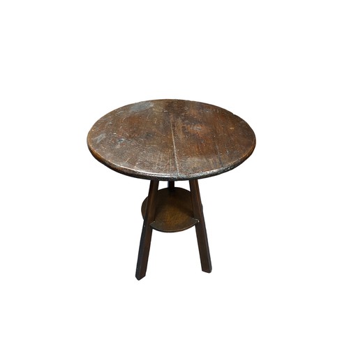 291 - Decorative two tier stained pine cricket table, diameter 61cm, height 71cm.