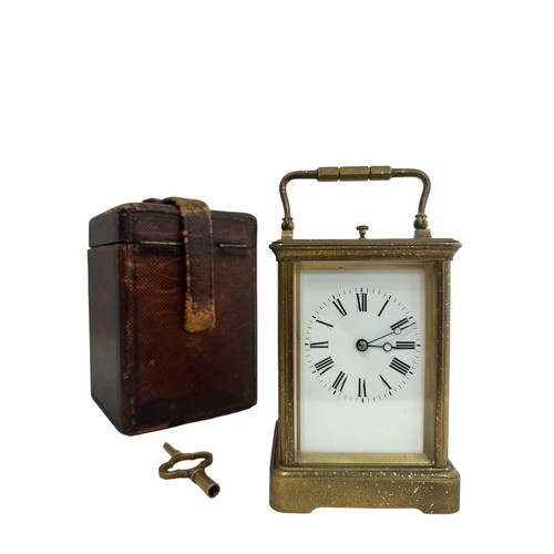 130 - A French repeating carriage clock, circa 1890s.  Housed in a brass case with a white enamel dial and... 