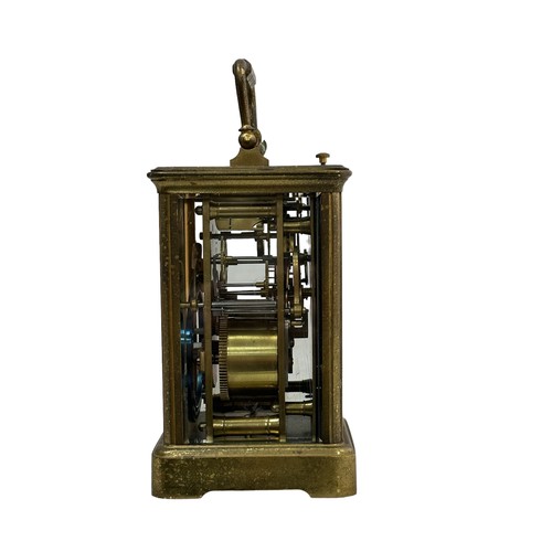 130 - A French repeating carriage clock, circa 1890s.  Housed in a brass case with a white enamel dial and... 