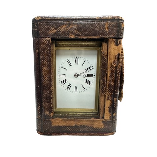 130 - A French repeating carriage clock, circa 1890s.  Housed in a brass case with a white enamel dial and... 